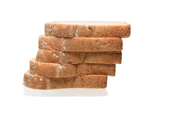 Fresh homemade  baked whole grain bread and sliced bread isolated on white