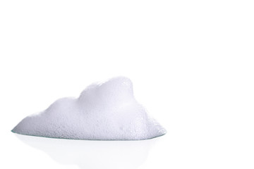 White foam bubbles texture isolated on white