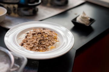 homemade muesli on white dish
