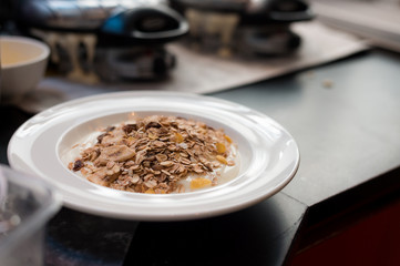 homemade muesli on white dish