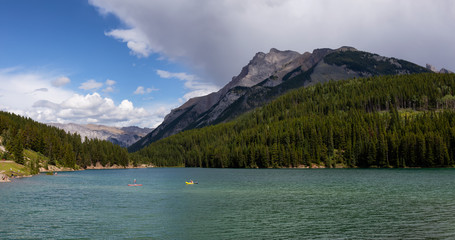 Beautiful View of Two Jack Lake during a sunny summer day. Taken in Banff National Park, Alberta, Canada.