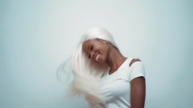 African sexy woman with white hair on white
