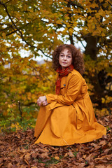 Autumnal portrait of a mature woman