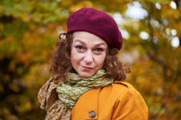 Autumnal portrait of a mature woman