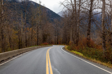 Fototapeta premium Pemberton, British Columbia, Canada. View of the Scenic Highway during a wet Autumn Season.