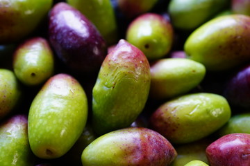 Fresh green and black olives at a market in Australia
