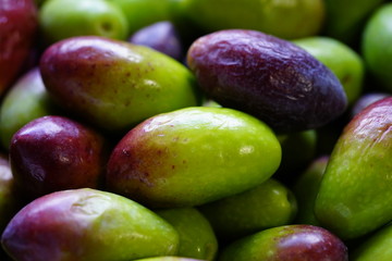 Fresh green and black olives at a market in Australia