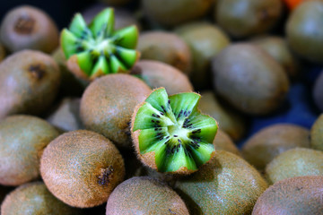 Kiwi fruit cut in half with zig-zag edges