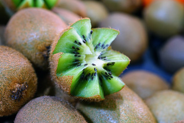 Kiwi fruit cut in half with zig-zag edges