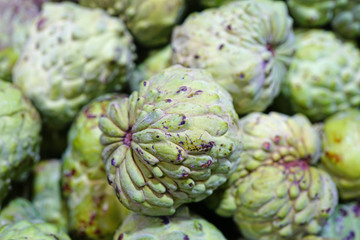 Annona fruit in bulk at a market