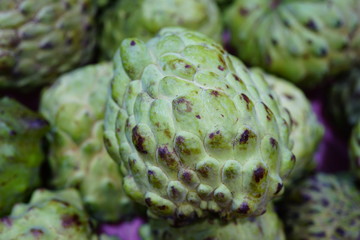 Annona fruit in bulk at a market