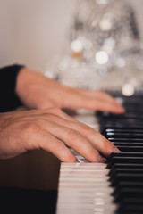 Fototapeta premium Hands playing piano