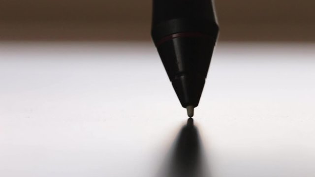 Designer working on graphic tablet. Low light close-up shot 1080p