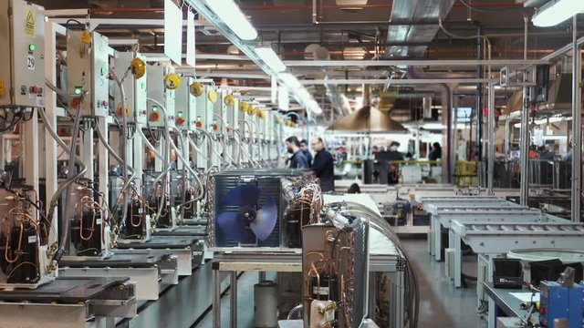 Assembly Line Workers in the Refrigerator Assembly Plant. 