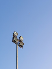 Spotlight for outdoor square shape 4 piece made with steel stick on the pole steel have blue sky...