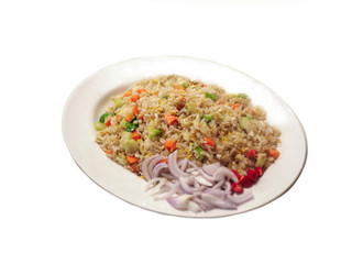 Fried rice with bright colors on a white plate.
