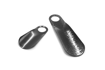 Two horns for putting on shoes. Close up. Isolated on white background