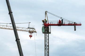Assembling and erecting a construction Tower Crane with the aid of a Mobile Boom Crane. Australia.  2017. November 16,  2:41 PM.