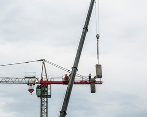Assembling and erecting a construction Tower Crane with the aid of a Mobile Boom Crane. Australia.  2017. November 16,  3:15 PM.