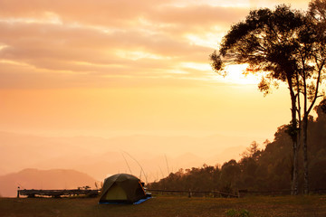 Fototapeta na wymiar Camping tent on the mountain at sunrise.
