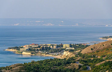 Fototapeta na wymiar Hotels of Green Thracian cliffs near Black Sea, rocky path seaview