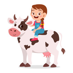 happy cute kid girl riding cute cow