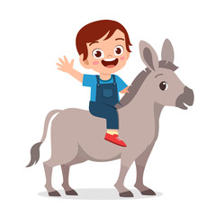 happy cute kid boy riding cute donkey