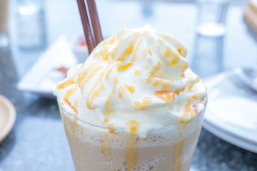 whip cream and caramel of ice coffee.