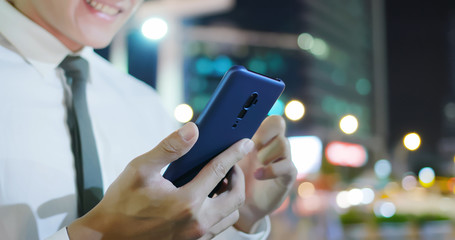 businessman use phone outdoor