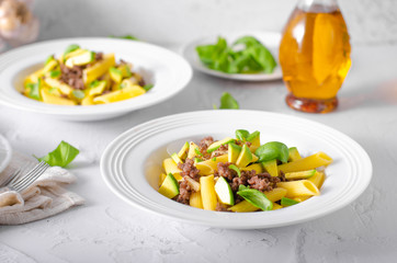 Delicous pasta with beef and fresh avocado
