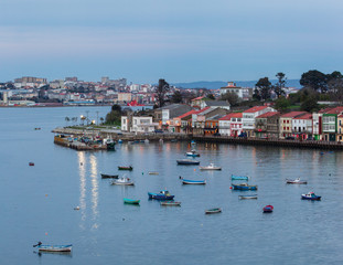 Fototapeta na wymiar Fishing Town of Mugardos with Ferrol in the Background La Coruña Galicia