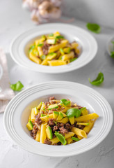 Delicous pasta with beef and fresh avocado