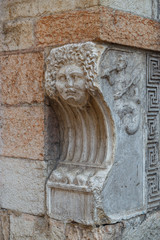 Antique detail in the building in the historic centre of Verona, Italy