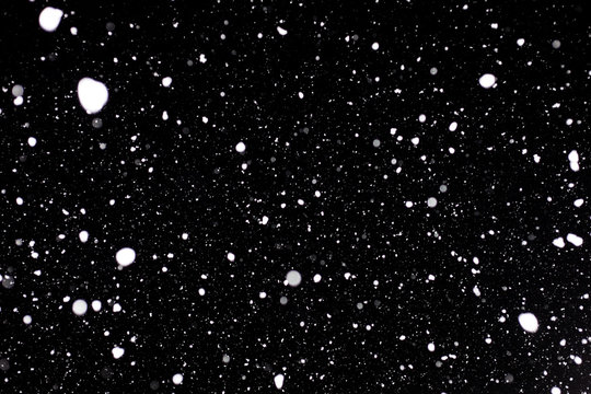 Winter Snow Storm With Real Snowflakes On A Dark Black Sky. Many Snowflakes To Be Used On Overlay