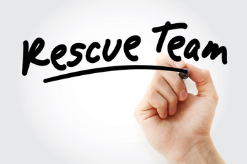 Hand writing Rescue team with marker, business concept background