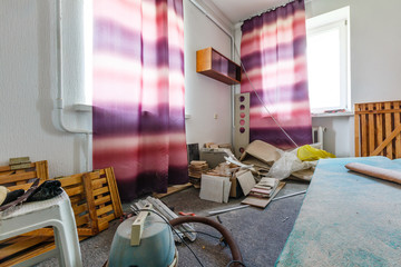 Devastated kitchen in a demolition house © Angelov