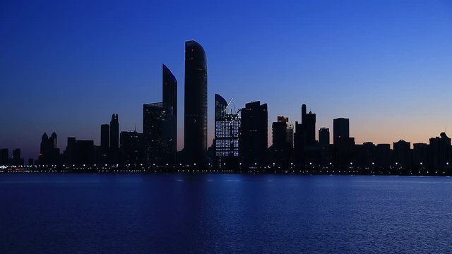 Abu Dhabi cityscape silhouette at blue hour