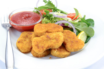 chicken nuggets on a plate