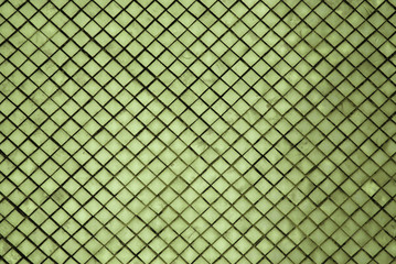 Abstract - Sculpture of Green wall  texture square patterns of pagoda at Wat Phra Si Rattana Satsadaram or Royal Grand Palace buddha temple Bangkok Thailand.