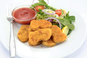 chicken nuggets on a plate