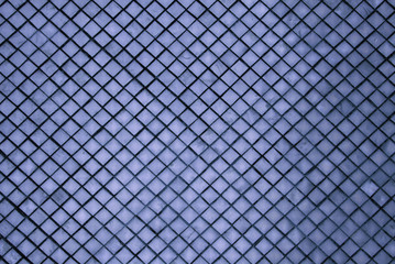 Abstract - Sculpture of blue wall  texture square patterns of pagoda at Wat Phra Si Rattana Satsadaram or Royal Grand Palace buddha temple Bangkok Thailand.