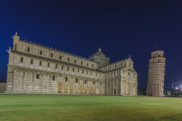 Fototapeta na wymiar Night view of the Leaning Tower of Pisa and Pisa Cathedral on Square of Miracles