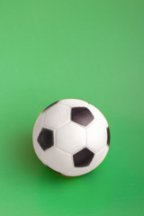 Globe and soccer ball on white background. December 10, World Football Day