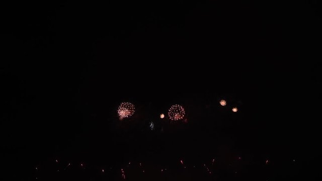 4k video footage of Real Fireworks on Deep Black Background Sky on Fireworks festival show before independence day on 4 of July