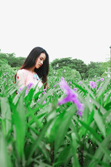 Portrait of beautiful young asian woman relaxing in garden