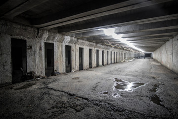 Abandoned underground tunnel with light trails