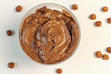 Walnut cream. Sweet cream in glass bowl. Confectionery, sweet life, calories.