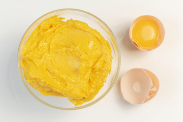 Sweet cream with egg liqueur. Sweet cream in glass bowl. Confectionery, sweet life, calories.