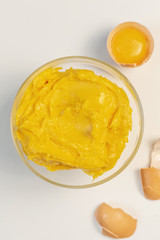 Sweet cream with egg liqueur. Sweet cream in glass bowl. Confectionery, sweet life, calories.