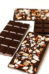 Handmade chocolate, assorted dark chocolate with nuts and goji berries.